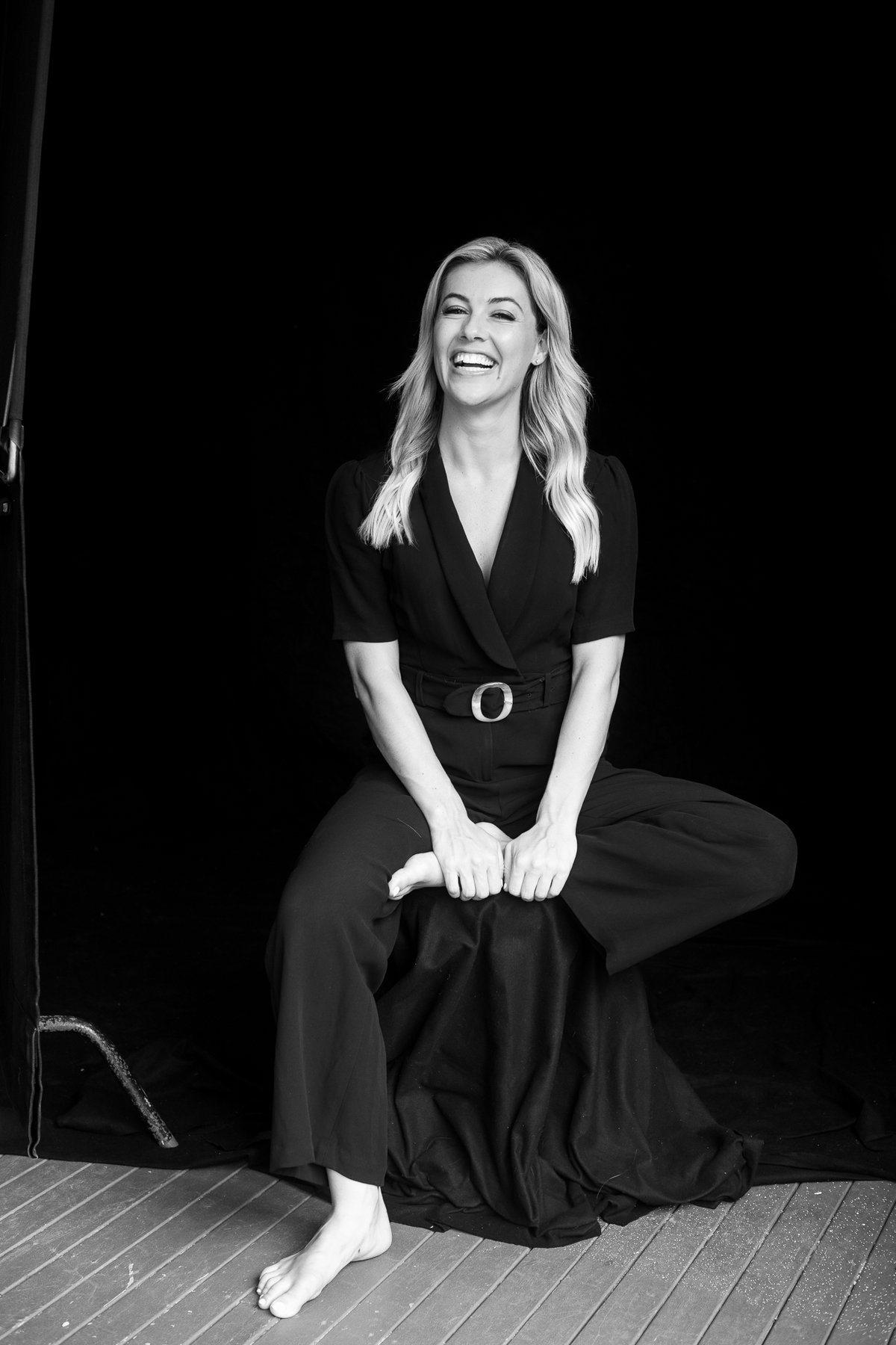 Black and white portrait of Gabriella Power laughing