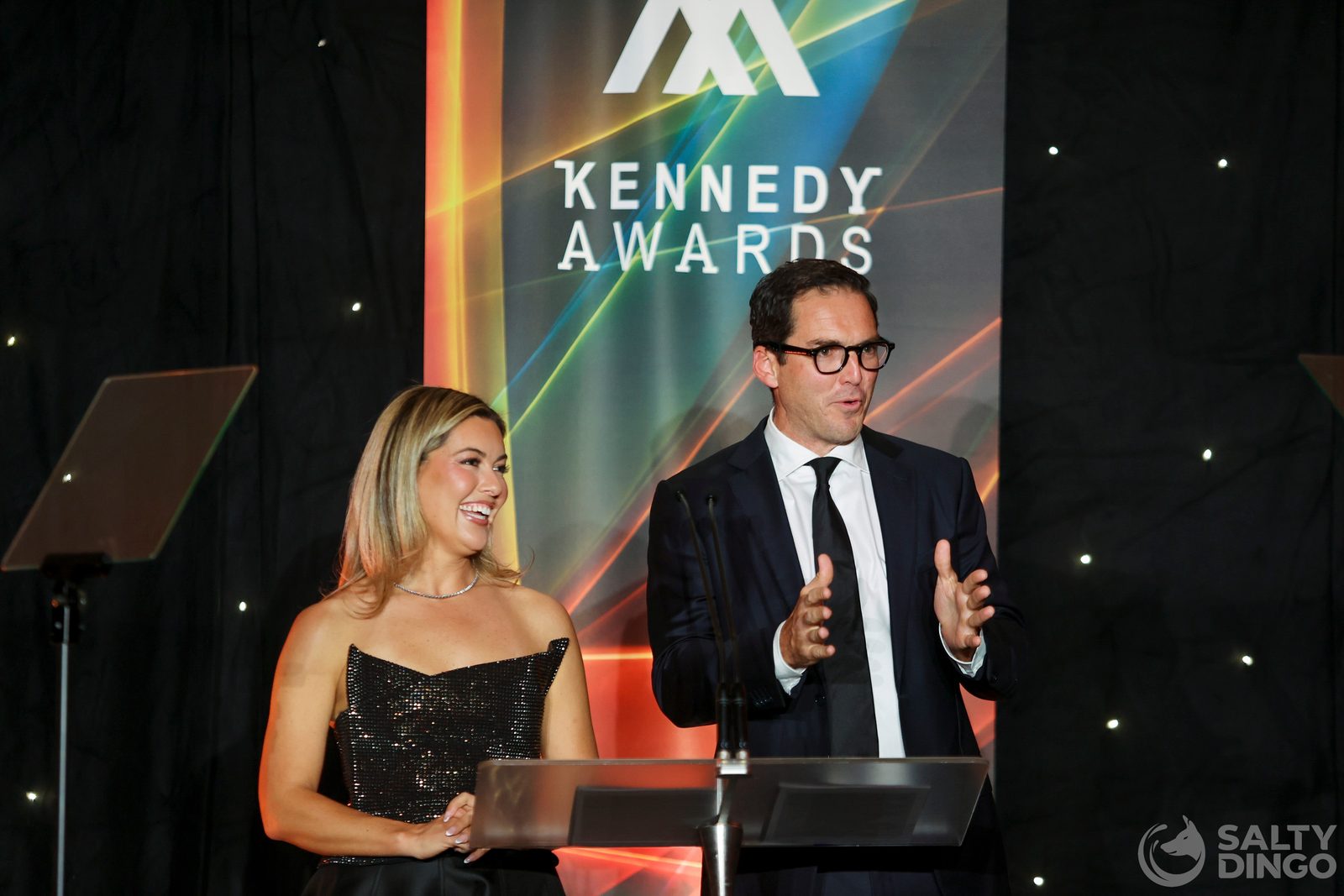 Gabriella Power and Peter Stefanovic at the Kennedy Awards podium